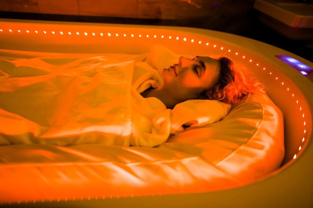 Caring about beauty, body wraps, hot spa capsule in spa salon.