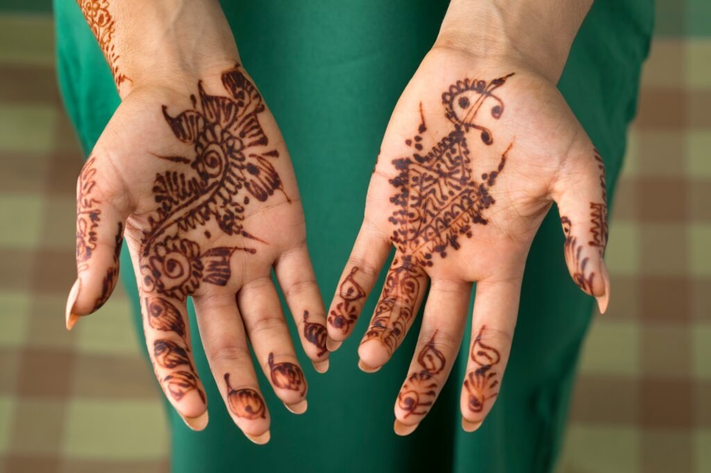 Moroccan woman with henna painted hands