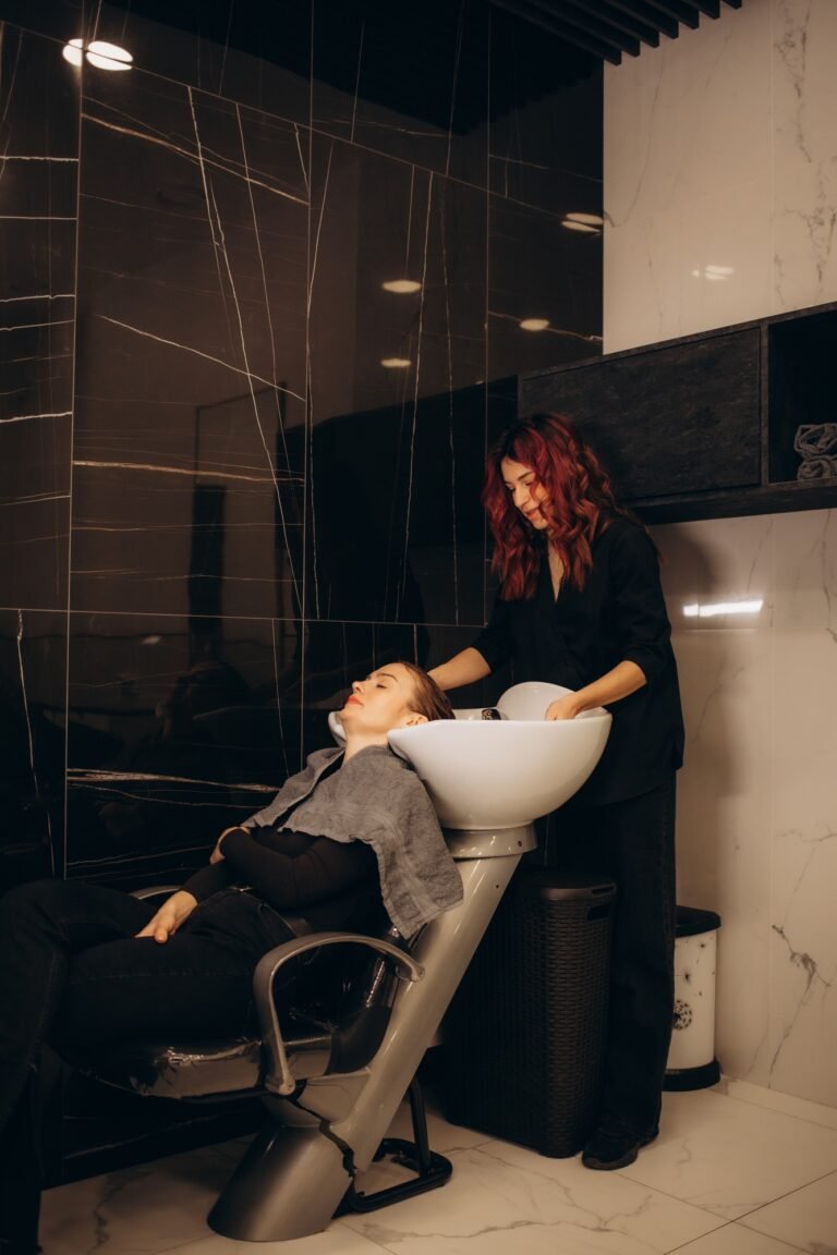 Portrait of women which wash hair in a beauty salon
