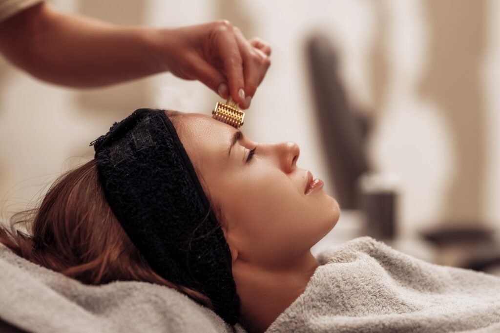 The woman is massaged face and body.